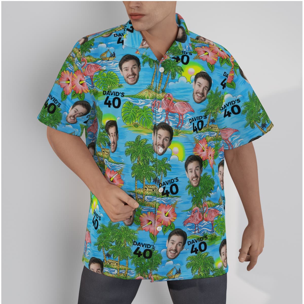 A Button Up Shirt with Blue Ocean Pattern and Pink Flamingo and Common Green Hawaiian Leaves, Tree and Flower