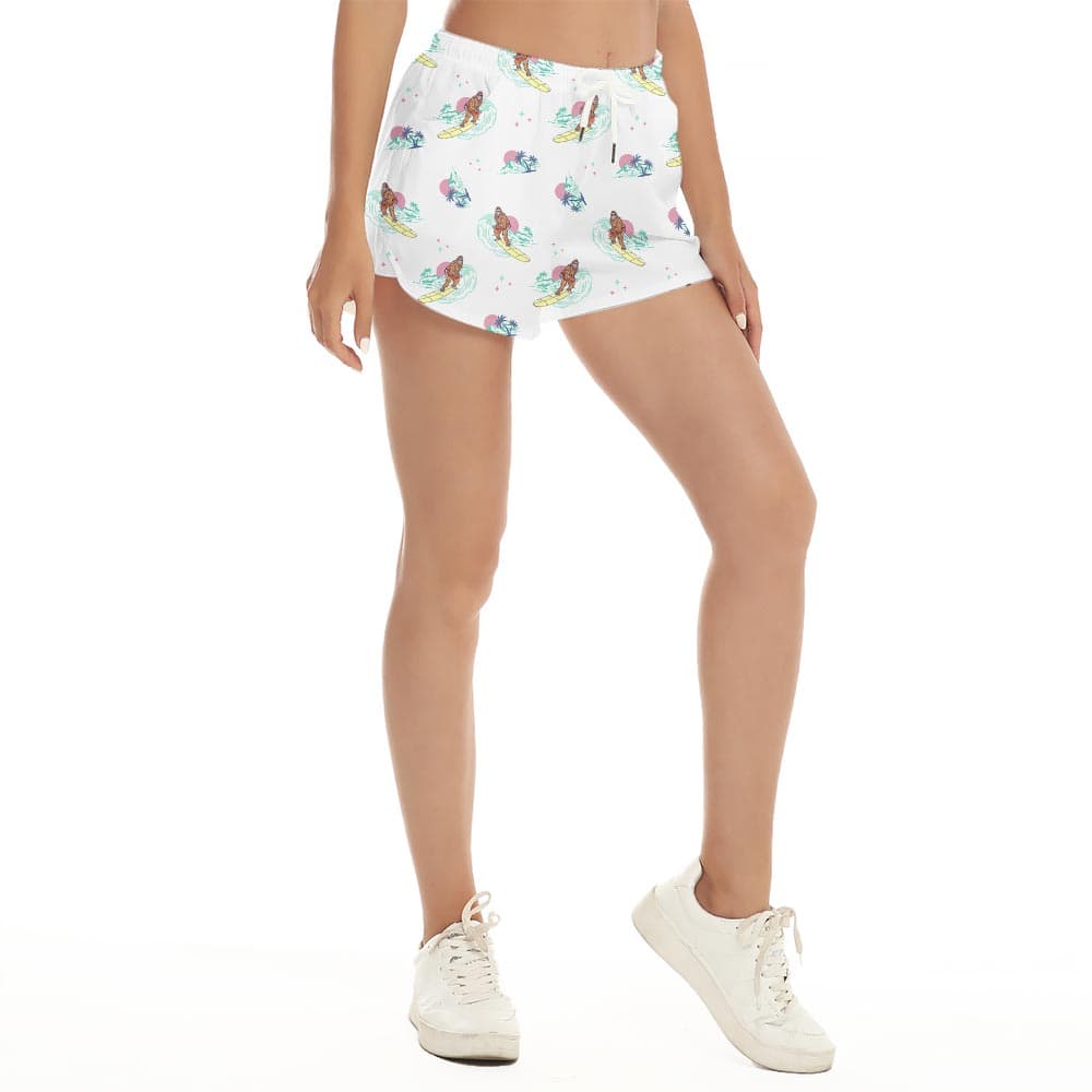 Funny Surfing Bigfoot Palm Trees Women's Beach Shorts