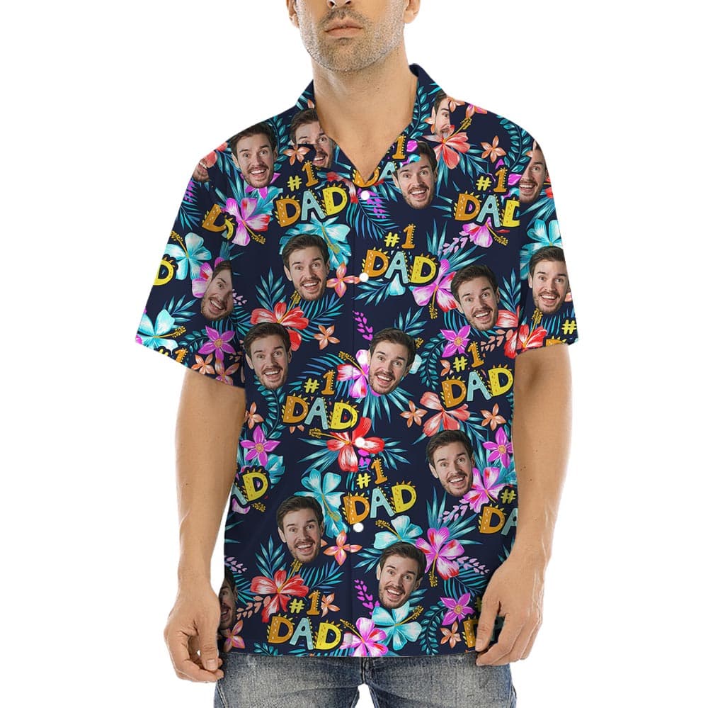Daddy Number One Personalized Hawaiian Shirt With Faces has a tropical print with dark background and colorful flowers, allows to custom faces with the proud quote #1 DAD
